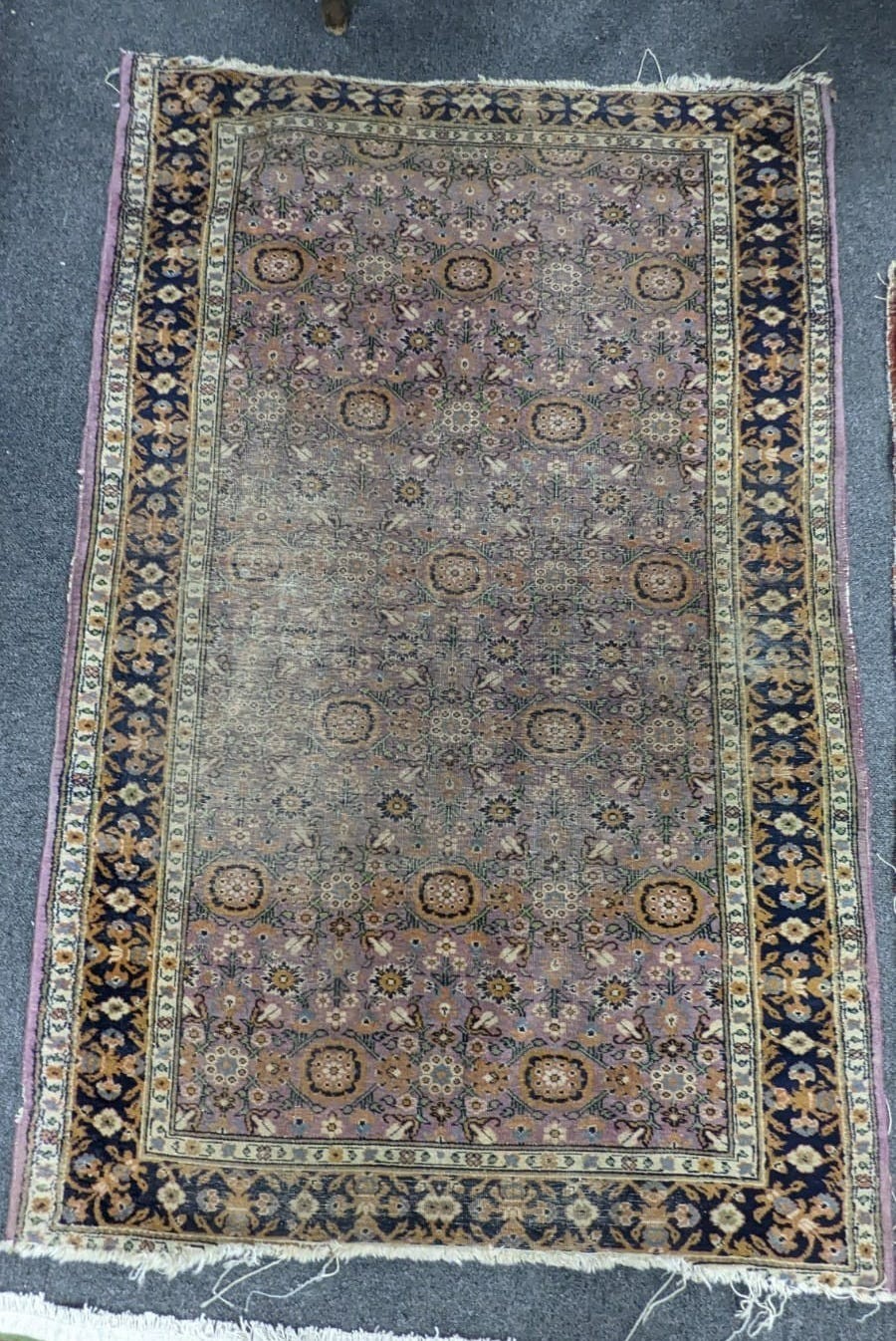 A Kashan rug and a Turkish rug, larger 194 x 123cm